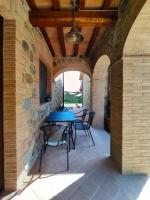 Patio lub wspólna przestrzeń na świeżym powietrzu w obiekcie Agriturismo Podere Il Sorbo