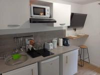 Plán poschodí v ubytovaní Appartement F2 de Standing avec terrasse et jardin privatif Aux Portes de Paris (M13)