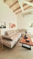 A seating area at Georgioupoli Villa with heated private pool and BBQ