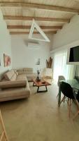 A seating area at Georgioupoli Villa with heated private pool and BBQ