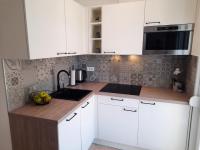 Kuchnia lub aneks kuchenny w obiekcie NewTown Apartment