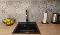 Kuchnia lub aneks kuchenny w obiekcie NewTown Apartment