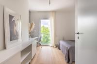 Postel nebo postele na pokoji v ubytování S35 Apartments Gdynia Orłowo