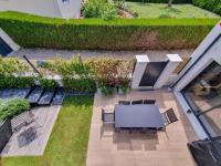 Ogród w obiekcie EXIGEHOME - Chambre d'hôte avec jacuzzi et jardin paysagé, partagé