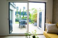 Część wypoczynkowa w obiekcie EXIGEHOME - Chambre d'hôte avec jacuzzi et jardin paysagé, partagé