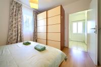 Postel nebo postele na pokoji v ubytování Apartments Aster