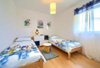 Postel nebo postele na pokoji v ubytování Apartments Aster