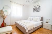 Posteľ alebo postele v izbe v ubytovaní Holiday Home King