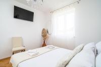 Posteľ alebo postele v izbe v ubytovaní Holiday Home King