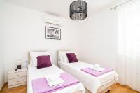 Posteľ alebo postele v izbe v ubytovaní Holiday Home King