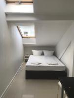 Posteľ alebo postele v izbe v ubytovaní Hoża Apartments and Rooms