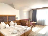 A bed or beds in a room at Boutique Hotel Eggele