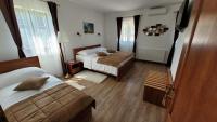 Posteľ alebo postele v izbe v ubytovaní B&B Plitvice Lakes Villa Mija