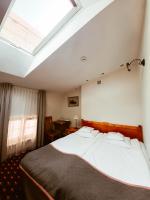 Posteľ alebo postele v izbe v ubytovaní Hotel Solaris