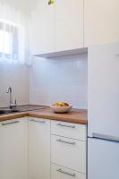 Kuchyň nebo kuchyňský kout v ubytování Apartments Žirje