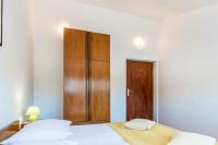 Postel nebo postele na pokoji v ubytování Apartments Žirje