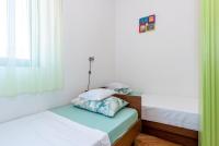 Postel nebo postele na pokoji v ubytování Apartments Žirje
