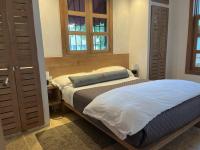 Postel nebo postele na pokoji v ubytování Billini Hotel, Historic Luxury
