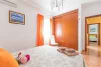 Łóżko lub łóżka w pokoju w obiekcie Villa Bella Lucia Luxury 2