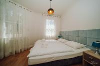 Posteľ alebo postele v izbe v ubytovaní Apartament Silence BORGUNO 06