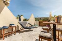 Balkon lub taras w obiekcie After Eight Heliopolis Naturiste