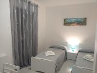 Posteľ alebo postele v izbe v ubytovaní B&B Il Dolce Nido