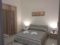 Posteľ alebo postele v izbe v ubytovaní B&B Il Dolce Nido