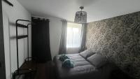 Część wypoczynkowa w obiekcie Logement avec terrasse,4 pers, parking