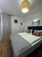 Postel nebo postele na pokoji v ubytování S&M Villa Kolobrzeg