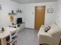 Televízia a/alebo spoločenská miestnosť v ubytovaní Apartament Cristina