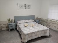 Posteľ alebo postele v izbe v ubytovaní Apartament Cristina