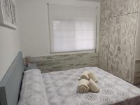 Posteľ alebo postele v izbe v ubytovaní Apartament Cristina