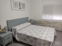 Posteľ alebo postele v izbe v ubytovaní Apartament Cristina