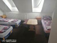 Postel nebo postele na pokoji v ubytování Penzion U Hladů