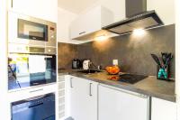 Kuchnia lub aneks kuchenny w obiekcie SELECT'soHOME - Résidence Le Levant - Services hôteliers - Appartement proche plage&commerces avec parking ! - LEV41