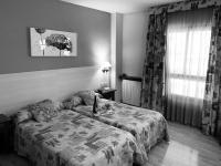 Posteľ alebo postele v izbe v ubytovaní Hotel BONCOMPTE