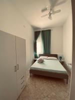 Posteľ alebo postele v izbe v ubytovaní Casa Vacanze , Scoglitti