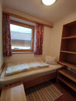 A bed or beds in a room at Ferienwohnung Maierhofer