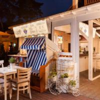 Reštaurácia alebo iné gastronomické zariadenie v ubytovaní Villa Puerto
