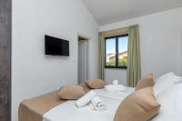 Łóżko lub łóżka w pokoju w obiekcie Villa Istria Vabriga