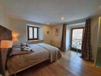 Łóżko lub łóżka w pokoju w obiekcie Appartement Marquise de 110m2 avec vue et sauna à 10 min des pistes