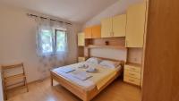 Postel nebo postele na pokoji v ubytování Apartments Gajo