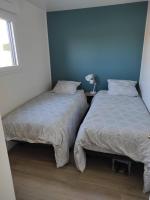 Posteľ alebo postele v izbe v ubytovaní Atlantic Lodge