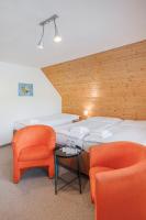 Postel nebo postele na pokoji v ubytování Hotel Rusava
