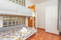 Postel nebo postele na pokoji v ubytování Villa Elfa