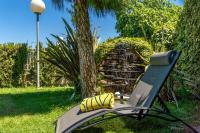 Zahrada ubytování Lujosa Casa Rural el Altico con barbacoa, chimenea y zona infantil