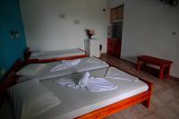 Postel nebo postele na pokoji v ubytování White Rock Apartments
