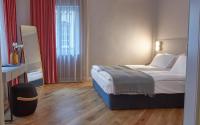 A bed or beds in a room at The Embassy Suites