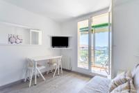 a white living room with a desk and a window at Cosy Apt Of 25 M Near The City View On Sea in La Seyne-sur-Mer