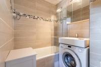 a bathroom with a washing machine and a sink at Cosy Apt Of 25 M Near The City View On Sea in La Seyne-sur-Mer